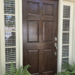 From Weathered to Wonderful: Restoring Our Doors for Under $20